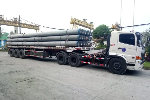 Pengiriman Tiang Spun Pile Menggunakan Truck Trailer
